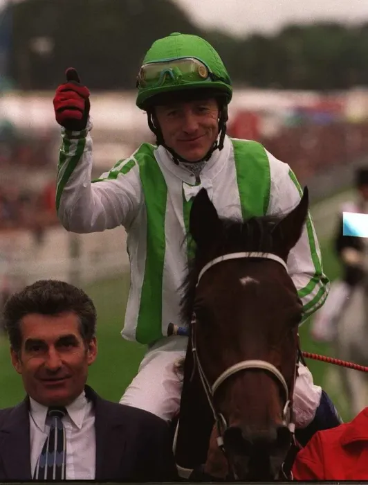 Framed Print : Oath ridden by jockey Kieren Fallon after winning the Derby at Epsom - June 1999