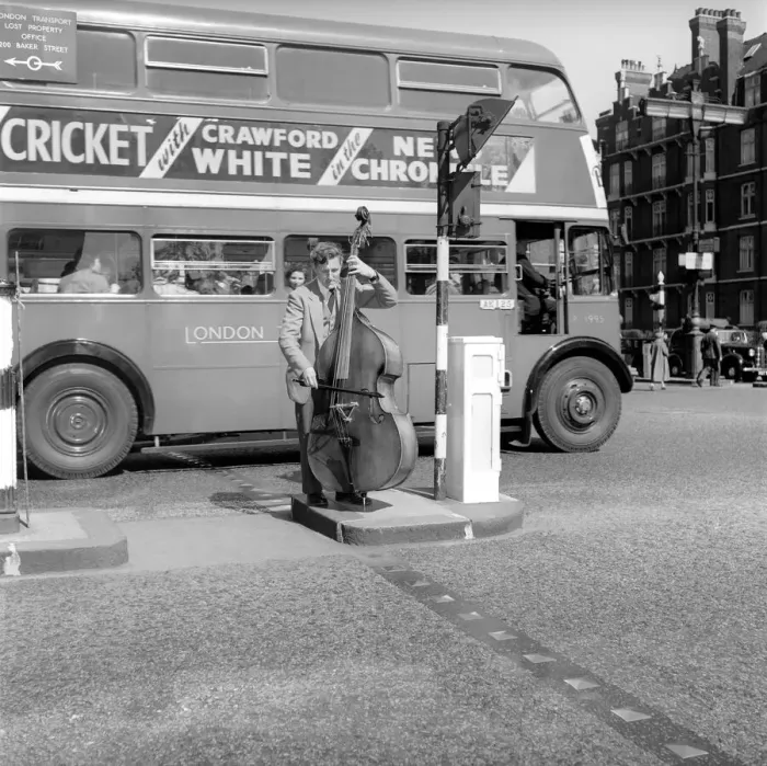 Framed Print : Occupation: Busker: Johnny Hawksworth seen here busking with his Double Bass in Central