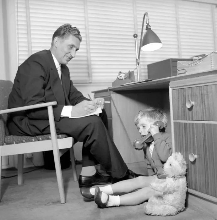 Framed Print : Office Junior: Two year old boy helps out at the offices of Theobald and son Framed Print : Office Junior: Two year old boy helps out at the offices of Theobald and son