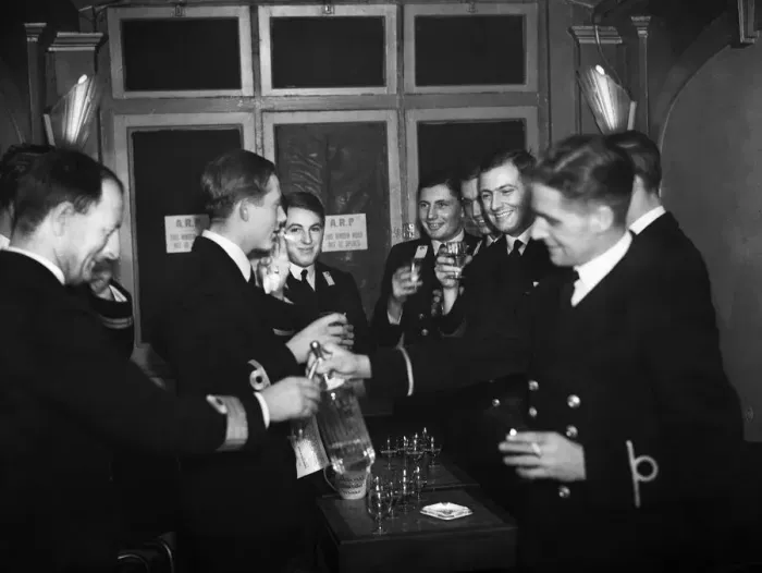Framed Print : Officers of HMS Ajax and Exeter enjoying a drink during the interval at the London Framed Print : Officers of HMS Ajax and Exeter enjoying a drink during the interval at the London