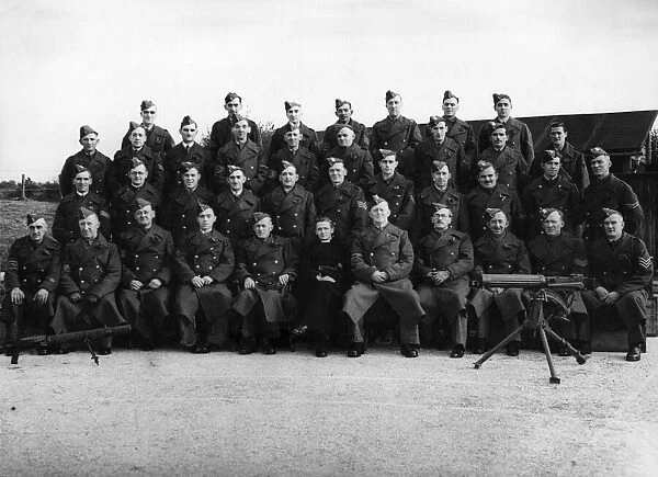 Officers and N. C. O.s of a West Wales battalion of the Home Guard pose for the camera
