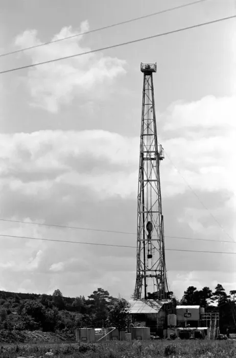 Framed Print : Oil well drilling for oil in Ireland. A farmhouse on the roadside has a grand stand view Framed Print : Oil well drilling for oil in Ireland. A farmhouse on the roadside has a grand stand view
