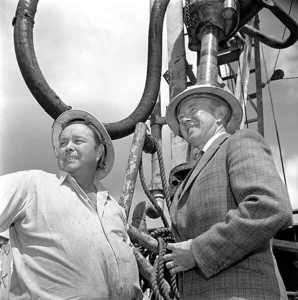 Oil well drilling for oil in Ireland. Noel Whitcomb pictured with oilman Gordon Bennett