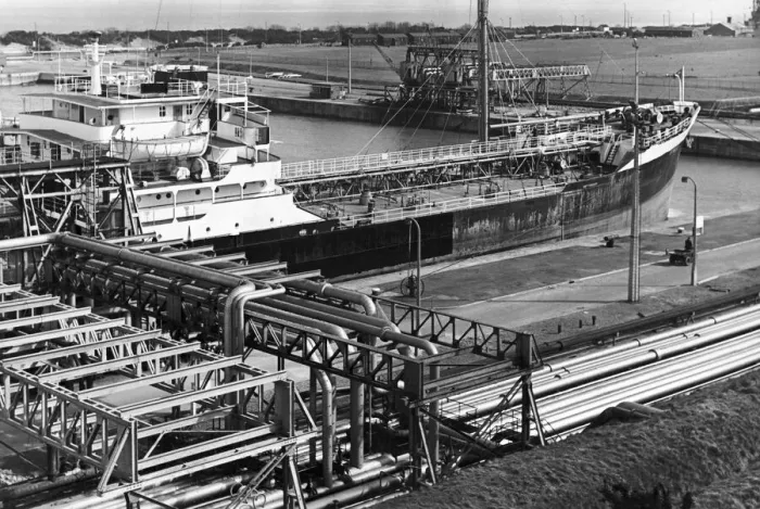 Framed Print : An oil tanker discharges oil at the quayside of the Queen Elizabeth II oil dock Framed Print : An oil tanker discharges oil at the quayside of the Queen Elizabeth II oil dock