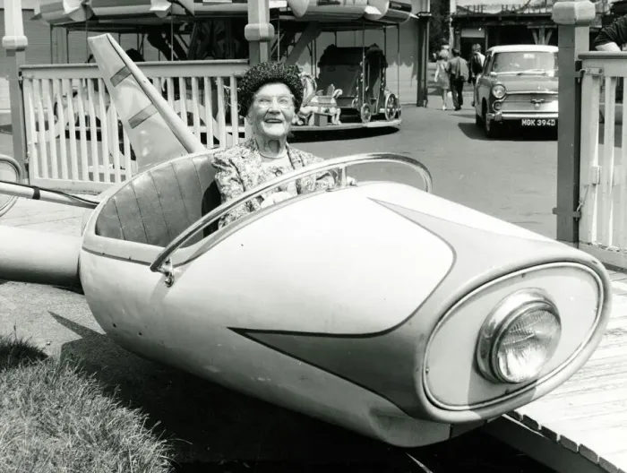 Framed Print : Old age pensioner Ellen Pert 101 years old rides in a fairground dive-bomber car ride Framed Print : Old age pensioner Ellen Pert 101 years old rides in a fairground dive-bomber car ride