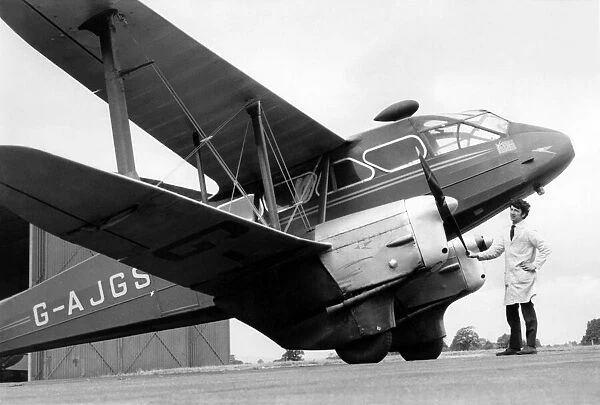 The old dragon prepares for its greatest test. Dragon Rapide G-AJGS being prepared for