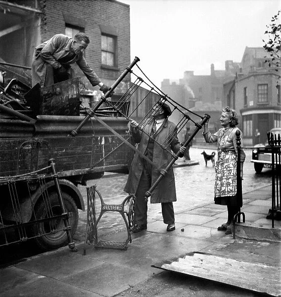 Any old iron. Fred Skidmore with a old bedstead. October 1952