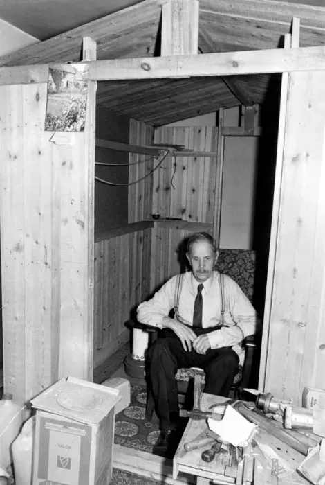 Framed Print : Old man inside a wooden shed. Jim Phillips at home in his little wooden hut Framed Print : Old man inside a wooden shed. Jim Phillips at home in his little wooden hut