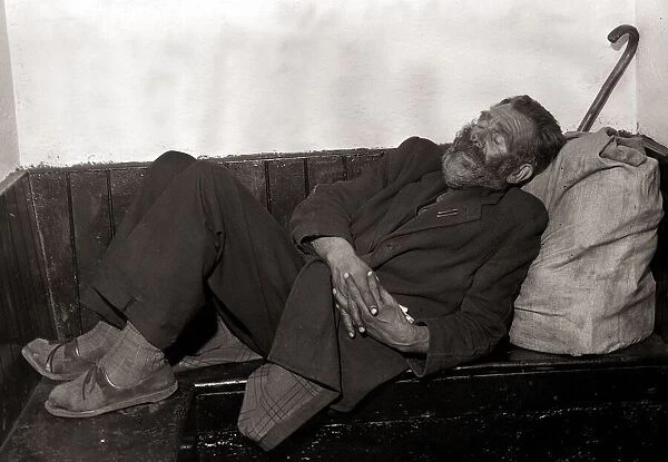 Old man sleeping on a bench - October 1963