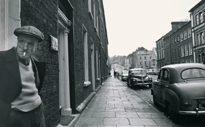 Framed Print : An old man standing in a doorway, smoking Street scene Georgian buildings Framed Print : An old man standing in a doorway, smoking Street scene Georgian buildings