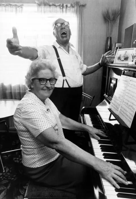 Framed Print : Old People - Jimmy Wallace sings away as he is accompanied by his wife Framed Print : Old People - Jimmy Wallace sings away as he is accompanied by his wife