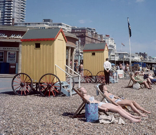 Old style bathing huts on the sea front at Brighton. 1st June 1968 Local Caption