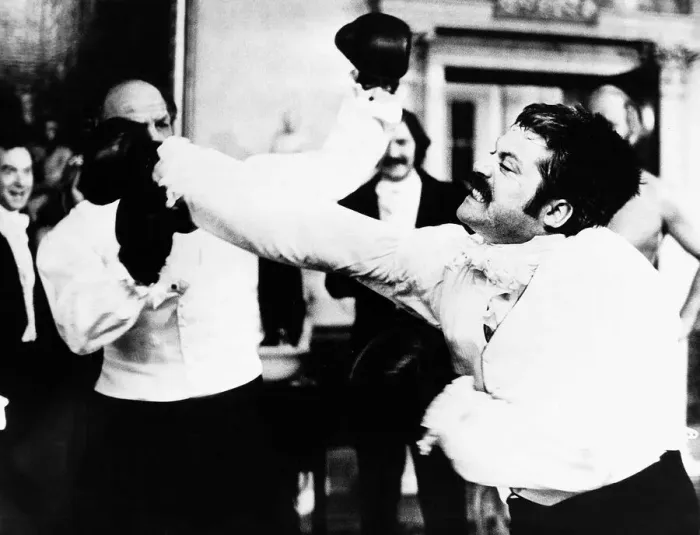 Framed Print : Oliver Reed actor as Bismark and Henry Cooper boxer - January 1975 In scene