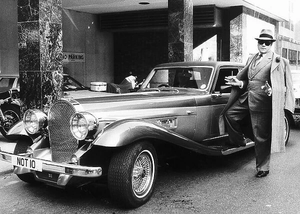 Oliver Reed with his Panther de Ville car in 1979
