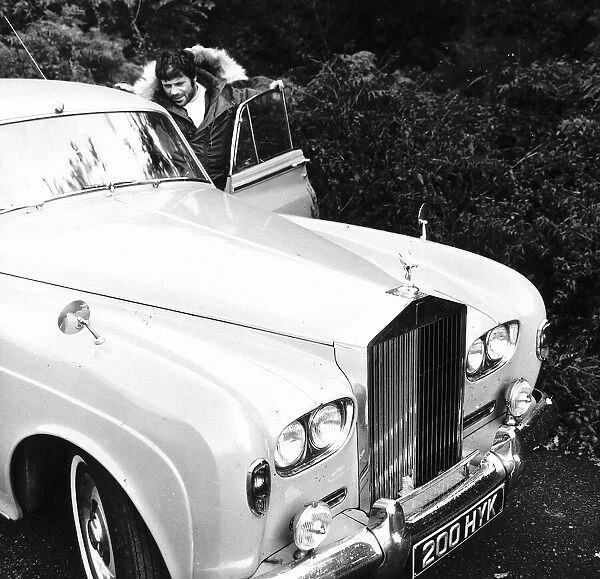 Oliver Reed with his Rolls Royce after Goblin hunting on Wimbledon Common