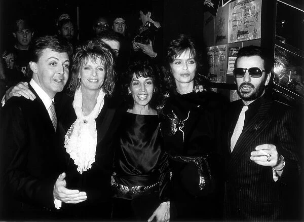 Olivia Harrison, wife of George, with former Beatle Paul McCartney and wife Linda