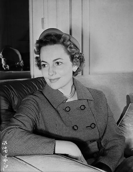 Olivia de Havilland, British American actress, arrived in the UK today to begin filming a