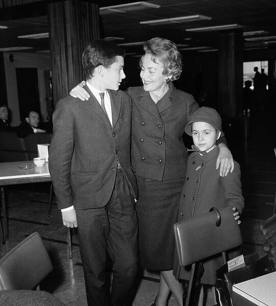 Olivia De Havilland at London Airport with her children Benjamin