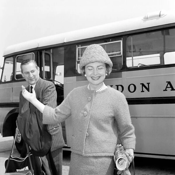 Olivia De Havilland seen here at London Airport after flying in from Paris