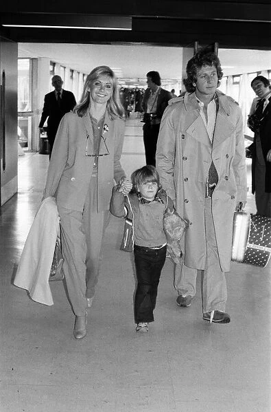 Olivia Newton John departing Heathrow Airport with her nephew Emerson