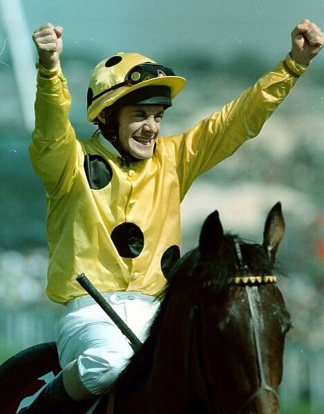 Olivier Peslier Jockey celebrates after winning the Derby on High Rise Racehorse as he is