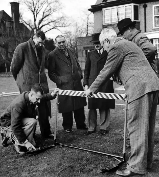 Framed Print : Olympic Games 1948 Mr Rottenburg explains the action of the extension Framed Print : Olympic Games 1948 Mr Rottenburg explains the action of the extension