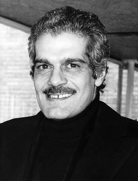 Omar Sharif Actor at London heathrow airport after flying in from Paris to play the part