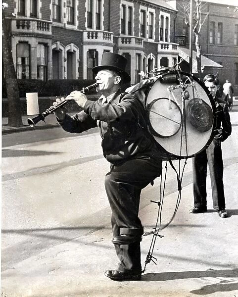 One-Man-Band - With all his complicated apparatus and his collecting box stuck on the end