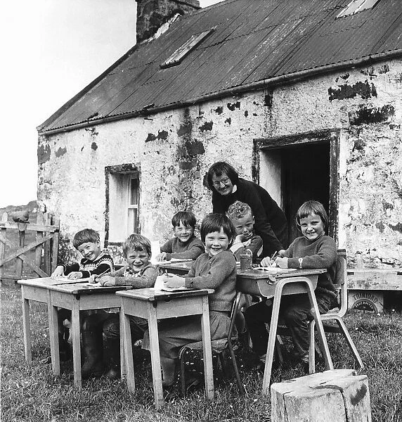 Open air lessons at Scoraig with teacher Celia Ertz outside the tiny schoolhouse. 1967