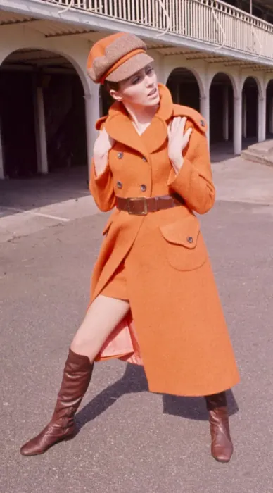 Framed Print : Orange maxi coat in hand woven tweed with matching hat designed by Jimmy Hourihan