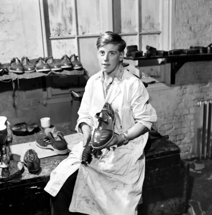 Framed Print : Orphan boy training to be a cobbler. December 1953 D7472A Framed Print : Orphan boy training to be a cobbler. December 1953 D7472A