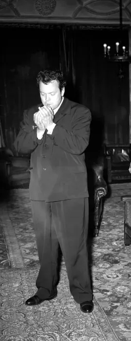 Framed Print : Orson Welles American Actor Film Producer - in London Hotel - smoking a cigar