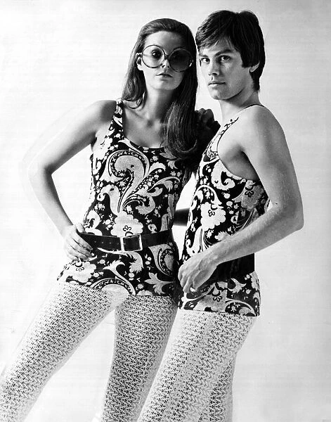 His and hers outfits of flowery tank tops and open knit stockings January 1970
