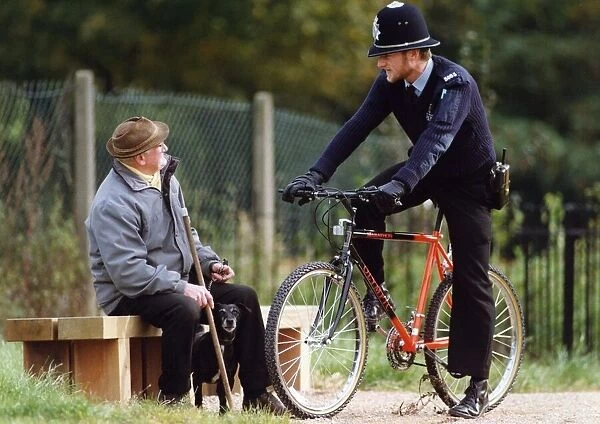 P. C. Stuart Martin on a bicycle patrol in Coventry, stops to chat to Bob Leighton