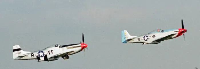 Framed Print : A pair of P51 North American Mustangs flying in formation at the Wroughton Airshow in