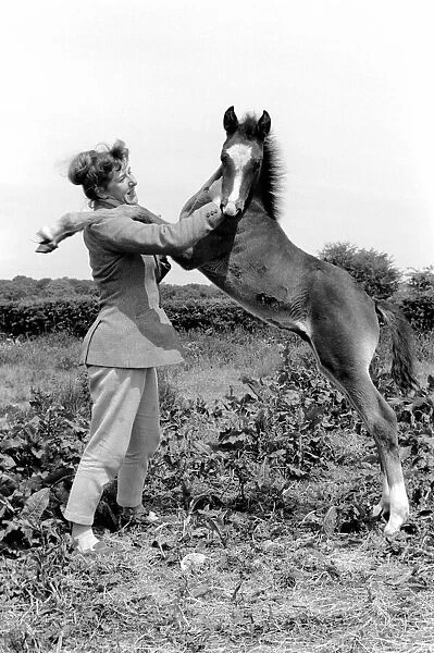 Pam Barrows seen here with foal called Miracle. June 1961 C65-002