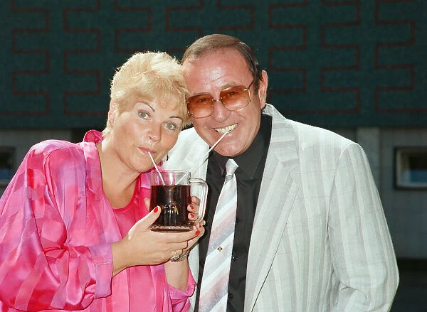 Pam St. Clement and Mike Reid who play Pat and Frank Butcher in the television soap