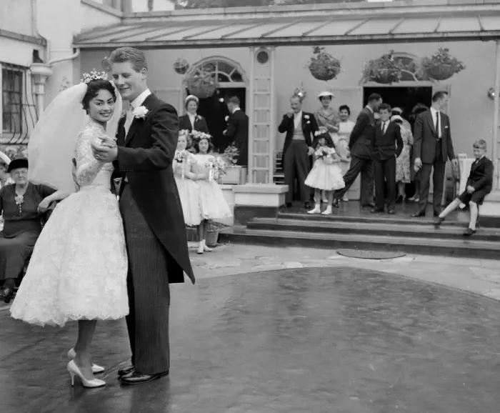 Framed Print : Pamela and David Moore lead the first dance in the rose garden at their reception Framed Print : Pamela and David Moore lead the first dance in the rose garden at their reception