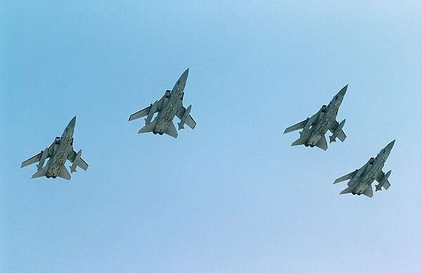 Four Panavia Tornado F3 of RAF 5 Sqd Sept 90 fly over their air base in formation