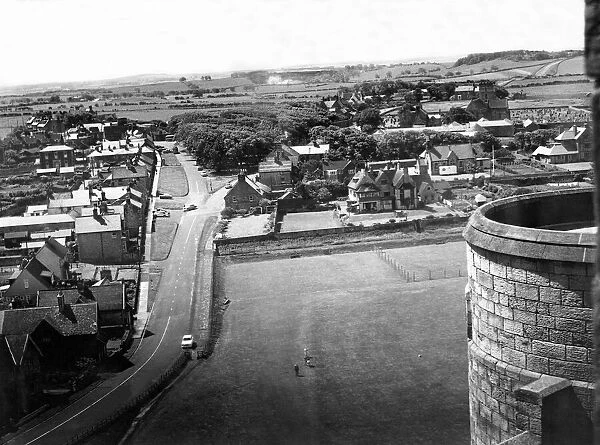A panoramic view of Bamburgh Village from the top of Bamburgh Castle 13 June 1960