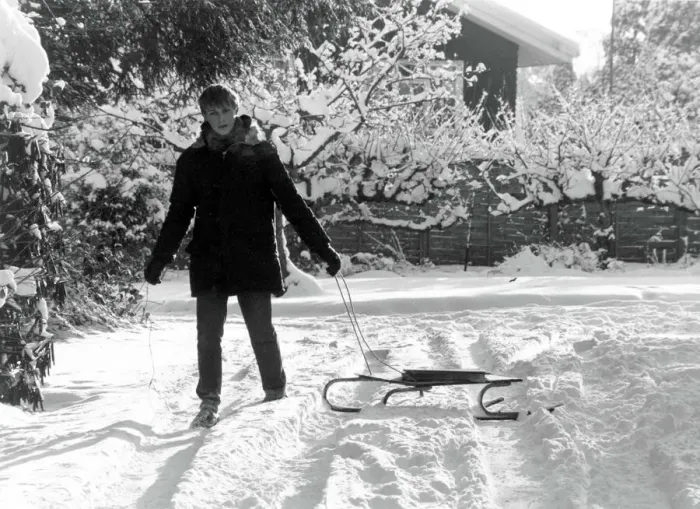 Framed Print : Paperboy Stephen Sales delivers his newspapers using a sledge after heavy snow in England Framed Print : Paperboy Stephen Sales delivers his newspapers using a sledge after heavy snow in England