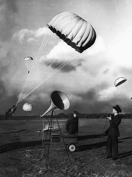Parachutists in descent during WW2. l Circa 1942
