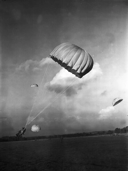 Paratroop Training at RAF Ringway, Manchester. England. Paratroopers about to land