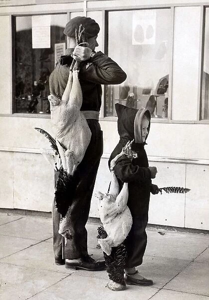 Paratrooper Robert Frost just back from Italy goes shopping with a little friend