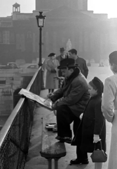 Framed Print : Paris street scenes - child watching an artist paint circa 1951