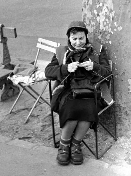 Framed Print : Paris street scenes - woman knitting circa 1951 Framed Print : Paris street scenes - woman knitting circa 1951