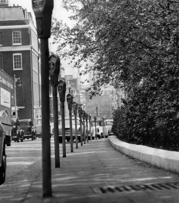 Framed Print : Parking Meters in Grosvenor Square, London. January 1965 P011349 Framed Print : Parking Meters in Grosvenor Square, London. January 1965 P011349