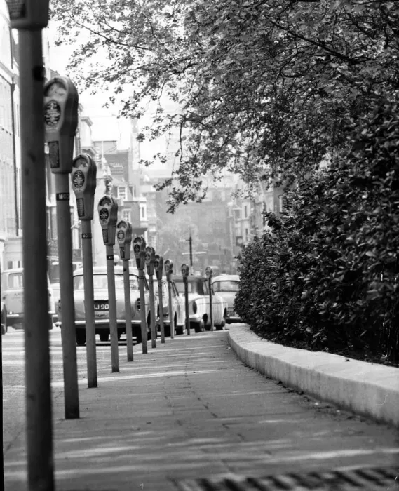 Framed Print : Parking metres in Grosvenor Square, London May 1965