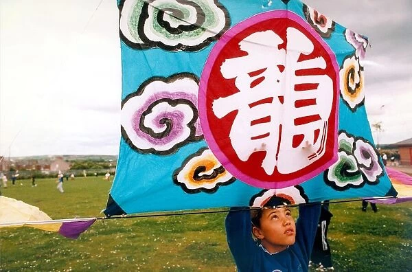 A participant in the annual kite festival at Washington in June 1995