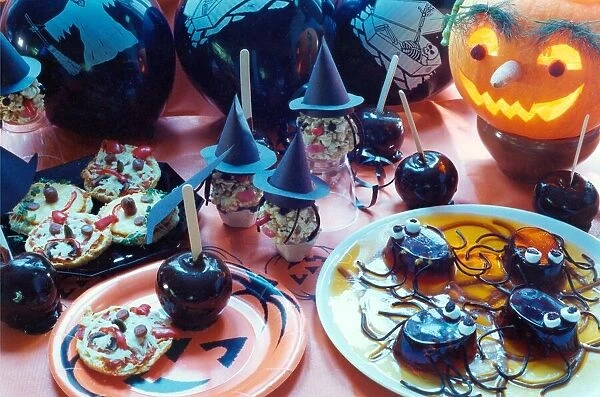 Some party food for Halloween in 1993. Some black toffee apples, spider jellies